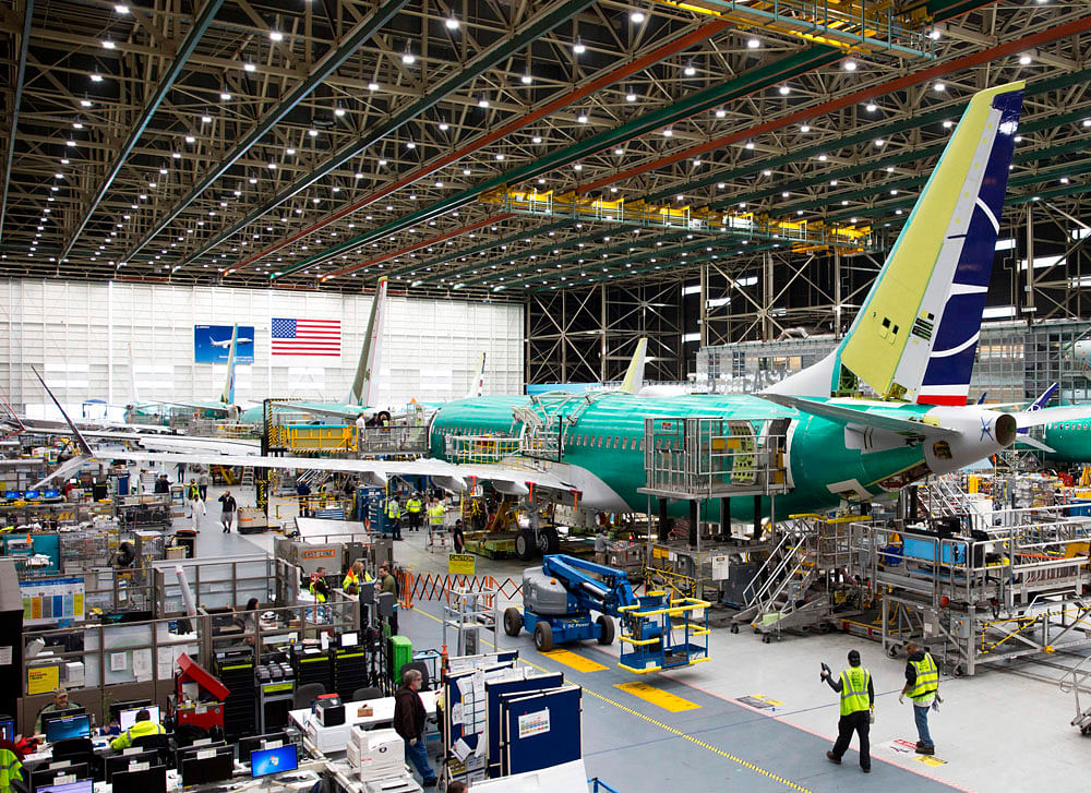 In this file photo taken on 27 March 2019 employees work on Boeing 737 MAX airplanes at the Boeing Renton Factory in Renton, Washington, United States. Photo: AFP