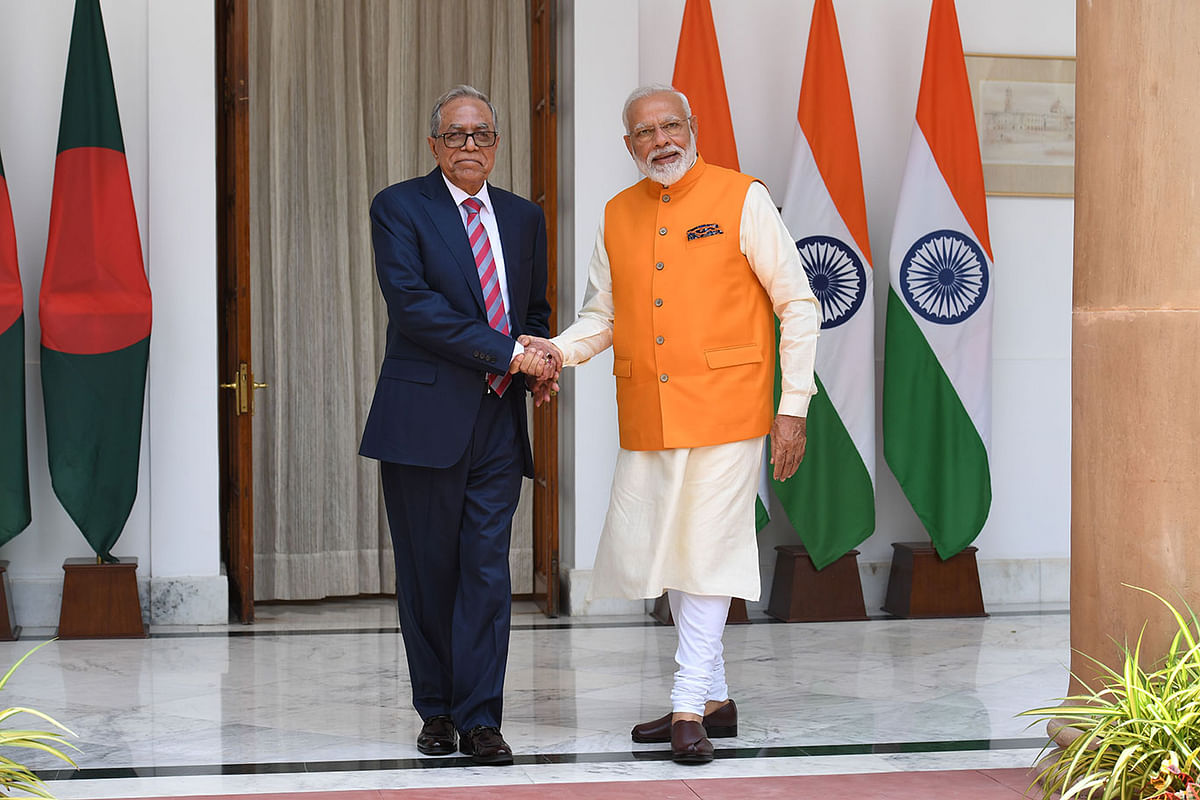 Indian prime minister Narendra Modi (R) shakes hands with Bangladeshi president Mohammad Abul Hamid prior to a meeting in New Delhi on 31 May, 2019. Photo: AFP