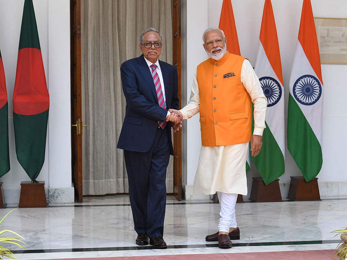 Indian prime minister Narendra Modi (R) shakes hands with Bangladeshi president Mohammad Abul Hamid prior to a meeting in New Delhi on 31 May, 2019. Photo: AFP