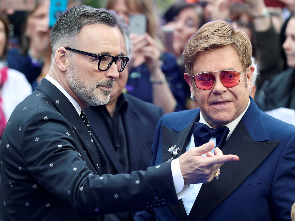 Elton John and his husband David Furnish attend the UK premiere of the Elton John biopic `Rocketman` in London, Britain on 20 May. Photo: Reuters