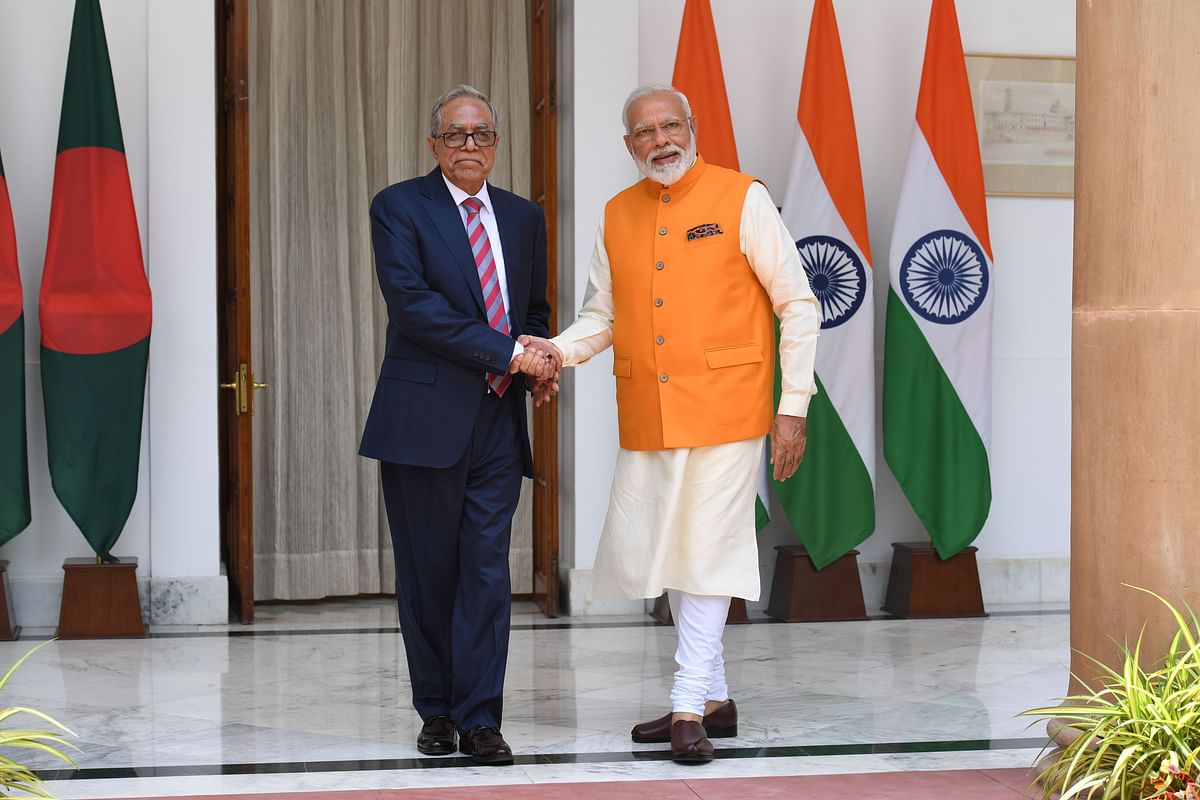 Indian prime minister Narendra Modi (R) shakes hands with Bangladeshi president Mohammad Abdul Hamid prior to a meeting in New Delhi on 31 May 2019. Photo: AFP