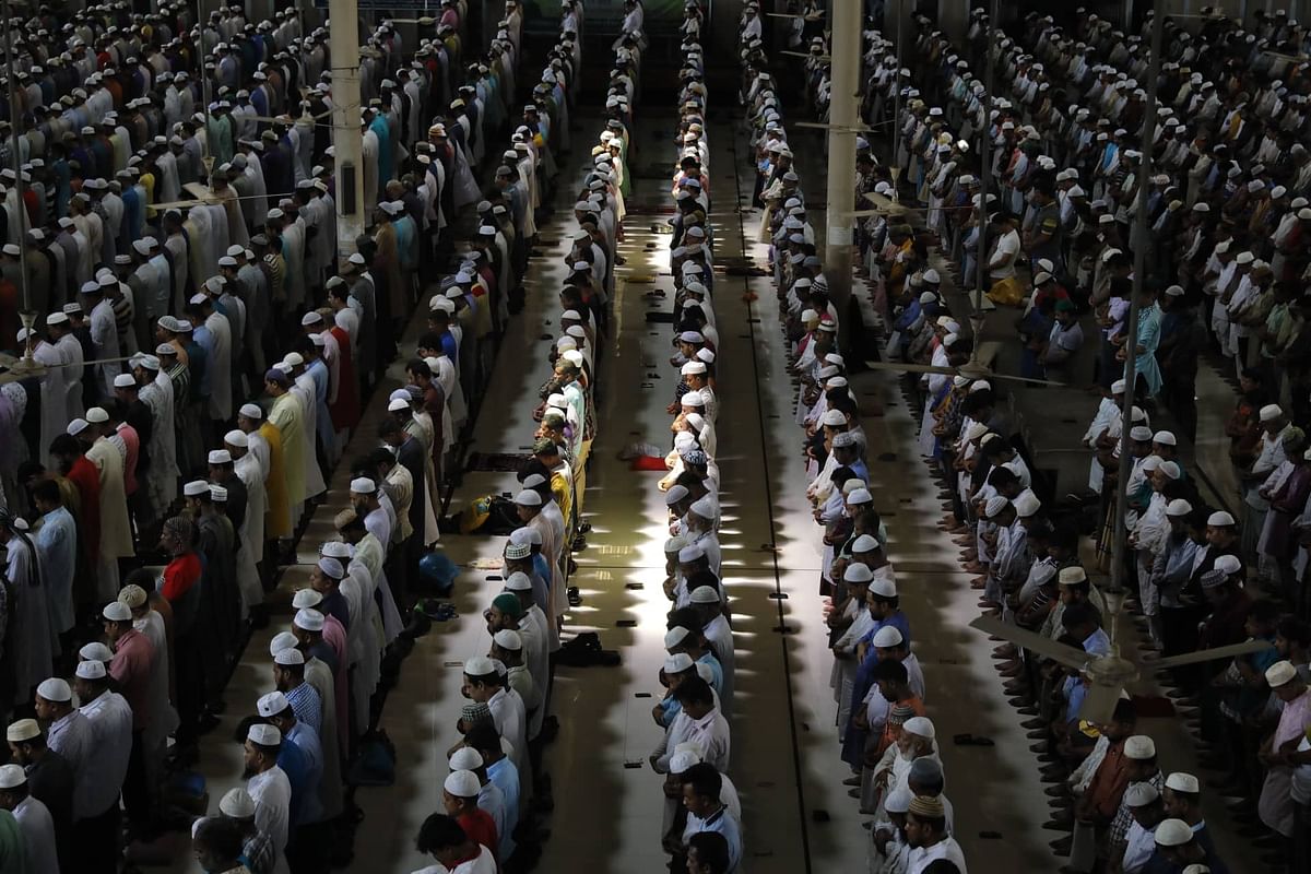Muslim devotees offer prayers at the Baitul Mukarram National Mosque in Dhaka during Jumatul Wida, or the last Friday prayers during the holy fasting month of Ramadan, on Friday. 31 May, 2019. Photo: Dipu Malakar