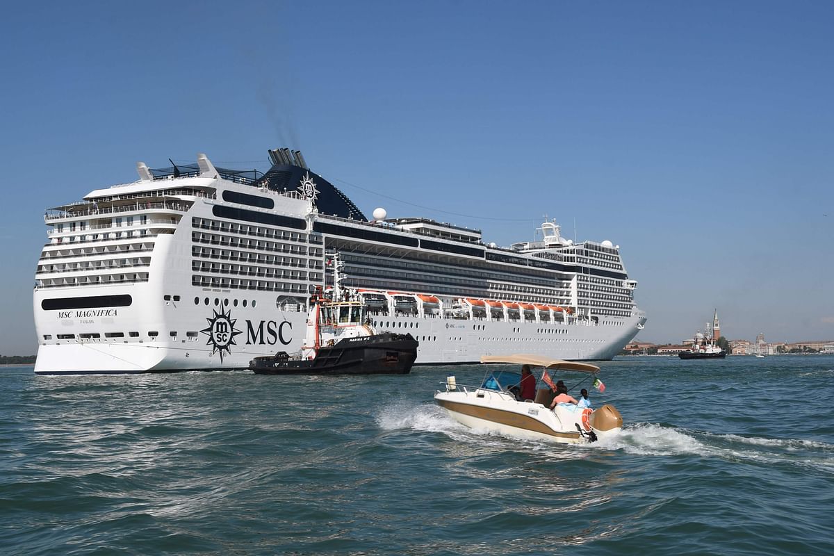 The MSC Magnifica cruise ship moors in St. Mark`s basin, after it was stopped following an incident between the River Countess tourist boat (not pictured) which was hit early on 2 June, 2019 by the MSC Opera cruise ship (not pictured) that lost control as it was coming in to dock in Venice, Italy. The accident reignited a heated row in the Serenissima over the damage caused to the city and its fragile ecosystem by cruise ships that sail exceptionally close to the shore. Photo: AFP