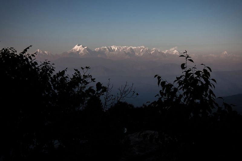 This file photo taken on 13 November 2015, shows a general view of the Himalayas from the hill-station of Kausani in the northern Indian state of Uttarakhand. Scores of emergency workers were battling bad weather Saturday to locate eight climbers missing on India`s second highest mountain, an official said. Photo: AFP