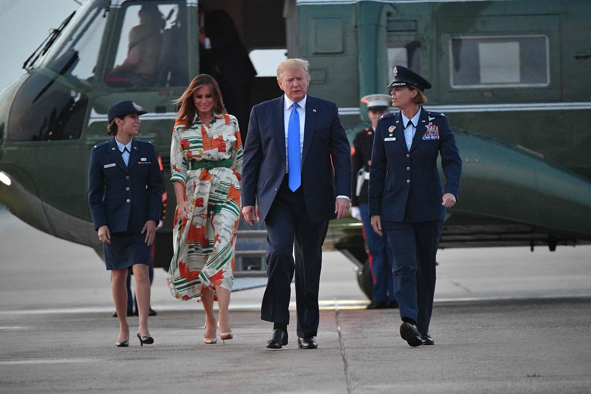 US president Donald Trump and First Lady Melania Trump stepped off Marine One and make their way to board Air Force One before departing from Andrews Air Force Base in Maryland on 2 June. Photo: AFP