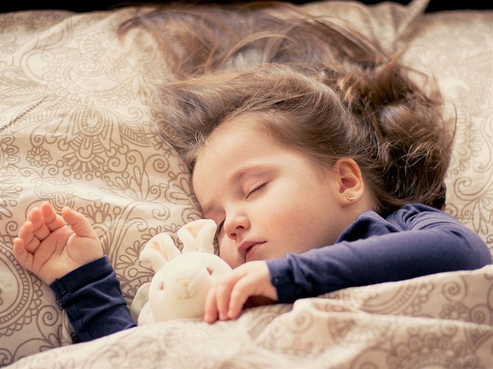 Children who nap at least three times a week are happier and have more self-control and grit, a new study says. Photo: Collected