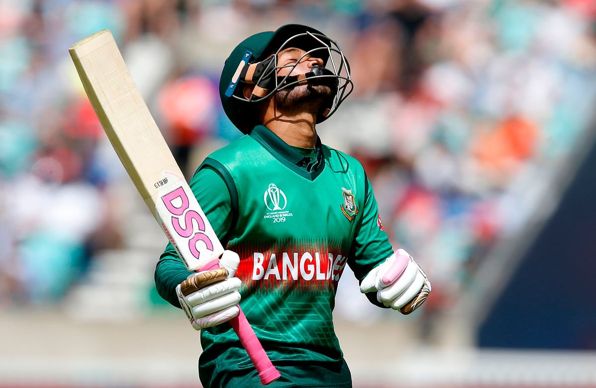 Bangladesh`s Mushfiqur Rahim reacts as he walks back to the pavilion after getting out for 78 runs during the 2019 Cricket World Cup group stage match between South Africa and Bangladesh at The Oval in London on 2 June 2019. Photo: AFP