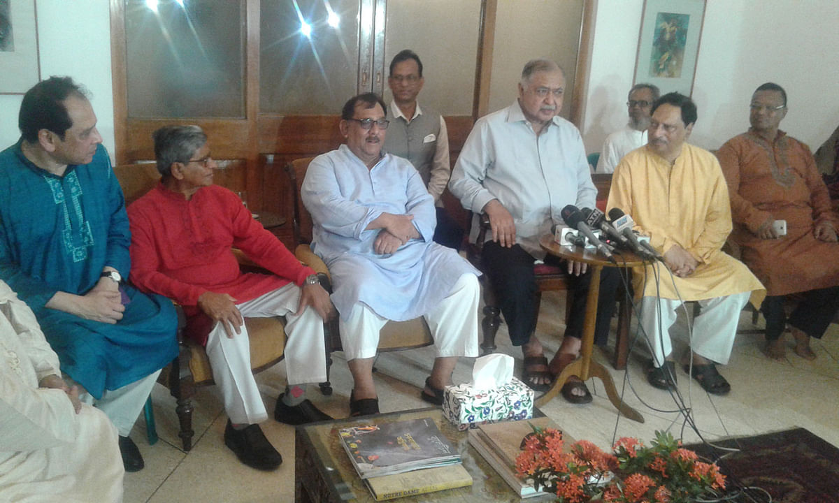Kamal Hossain briefs journalists after exchanging Eid greetings with leaders and activists of his party at his Baily Road residence in the capital on Thursday. Photo: Collected