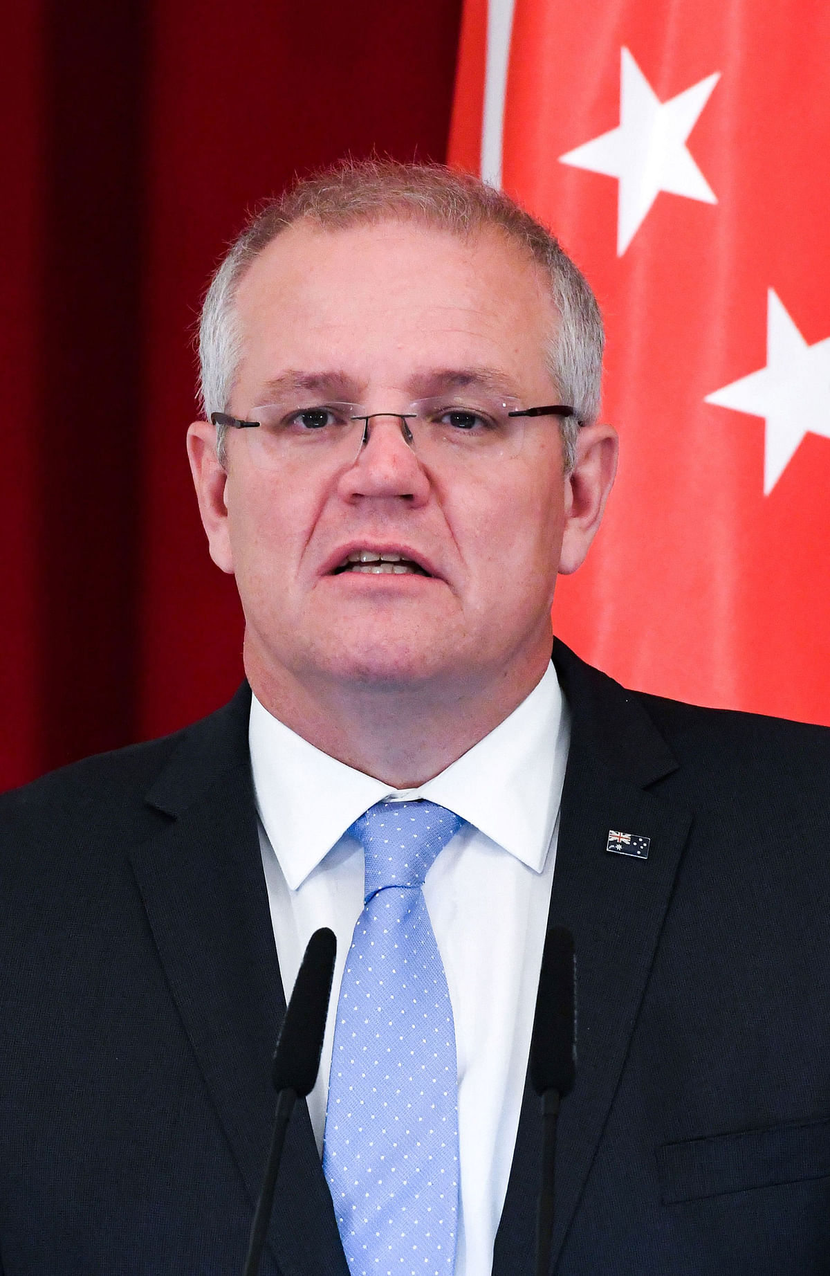 Australia’s prime minister Scott Morrison speaks at a joint press conference with Singapore`s Prime Minister Lee Hsien Loong (not pictured) at the Istana Presidential Palace in Singapore on 7 June. Photo: AFP