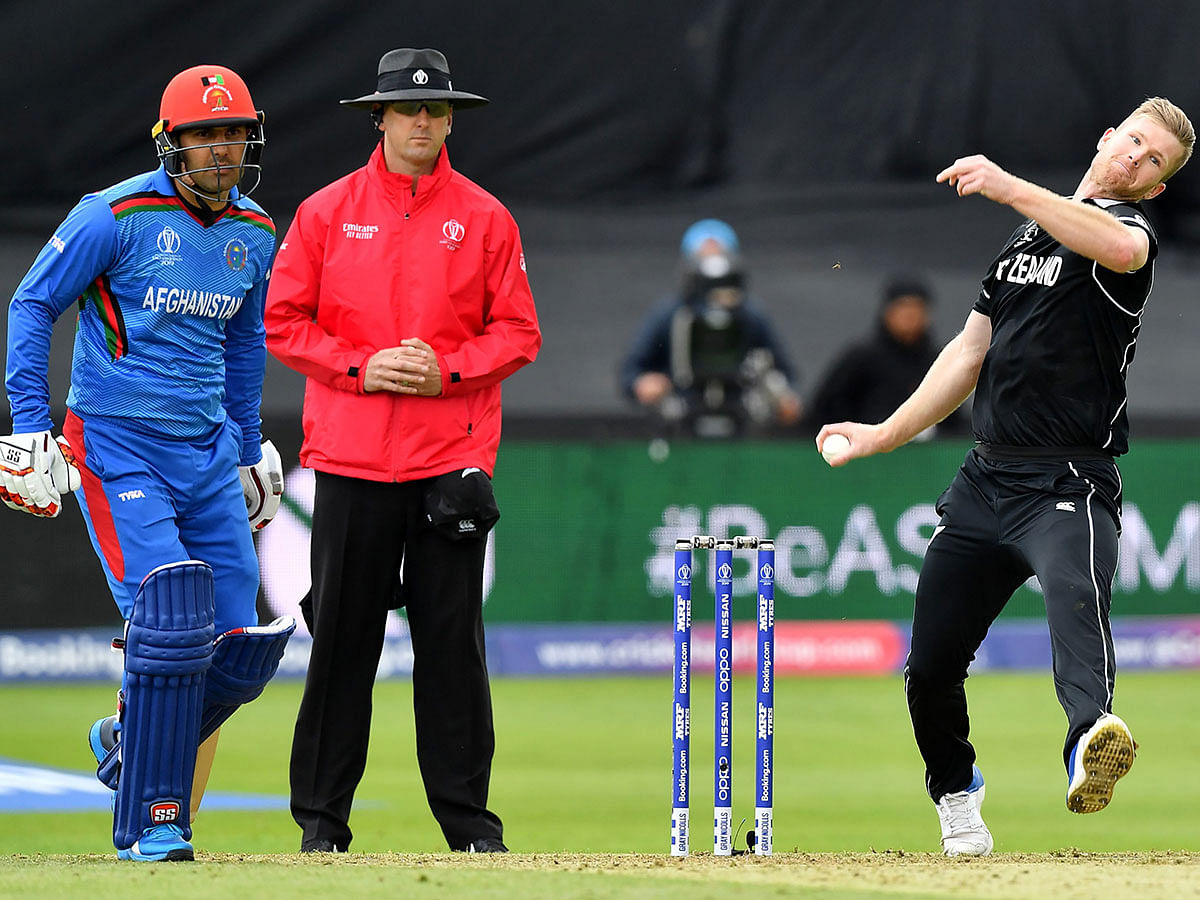 New Zealand`s James Neesham bowls during the 2019 Cricket World Cup group stage match between Afghanistan and New Zealand at The County Ground in Taunton, southwest England, on 8 June 2019. Photo: AFP