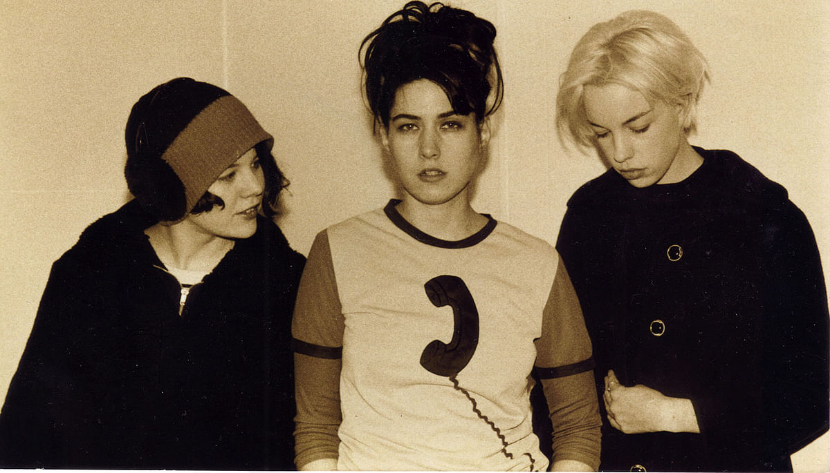In this unlocated image dated of the 1990`s and released by their New York based record company on 5 June 2019 Feminist Punk Band `Bikini Kill` members (from L-R) Tobi Vail, Kathleen Hanna, Kathi Wilcox pose for a picture. Photo: AFP