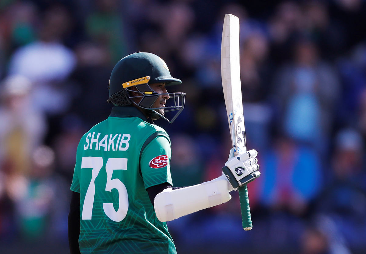 Bangladesh's Shakib Al Hasan celebrates after scoring a century (100 runs) during the 2019 Cricket World Cup group stage match between England and Bangladesh at Sophia Gardens stadium in Cardiff, south Wales, on 8 June, 2019. Photo: Reuters
