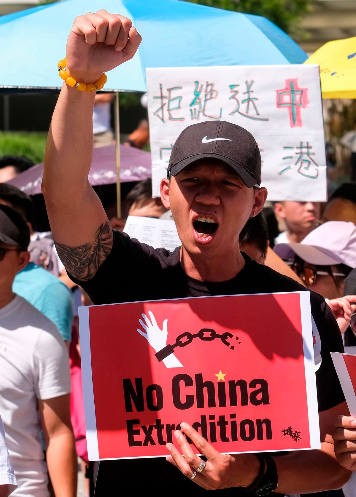 Protesters march during a demonstration to protest against a controversial extradition law proposed by Hong Kong`s pro-Beijing government to ease extraditions to China, in Los Angeles on 9 June 2019. Photo: AFP