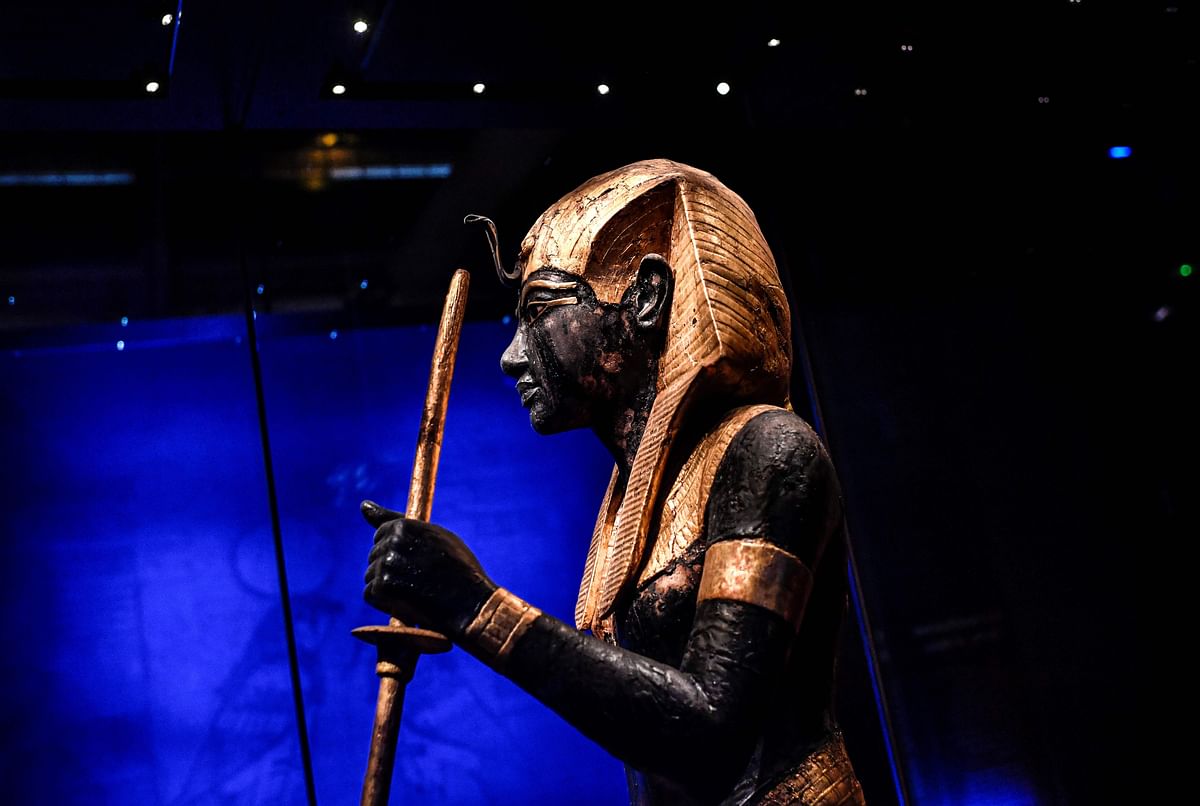 In this file photograph taken on 21 March 2019, a sculpture depicting Tutankhamun is displayed during the exhibition `Tutankhamun, Treasures of the Golden Pharaoh` at La Villette in Paris.