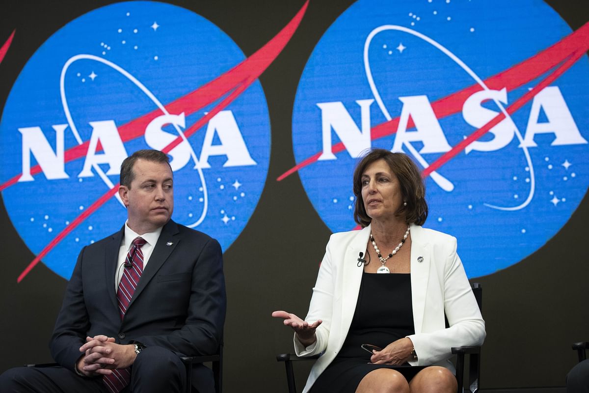 NASA Chief Financial Officer Jeff DeWit looks on as ISS Deputy Director Robyn Gatens speaks looks on during a press conference to address the opening of the International Space Station to expanded commercial activities, at the Nasdaq MarketSite, 7 June 2019 in New York City. Photo: AFP