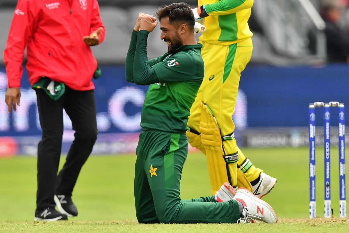 Pakistan's Mohammad Amir celebrates his fifth wicket during the 2019 Cricket World Cup group stage match between Australia and Pakistan at The County Ground in Taunton, southwest England, on 12 June, 2019. Photo: AFP