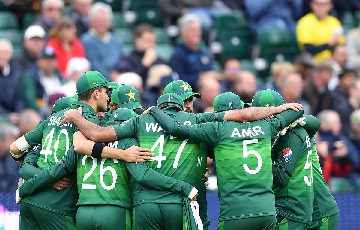 Pakistan`s cricketers huddle ahead of the 2019 Cricket World Cup group stage match between Australia and Pakistan at The County Ground in Taunton, southwest England, on 12 June 2019. Photo: AFP