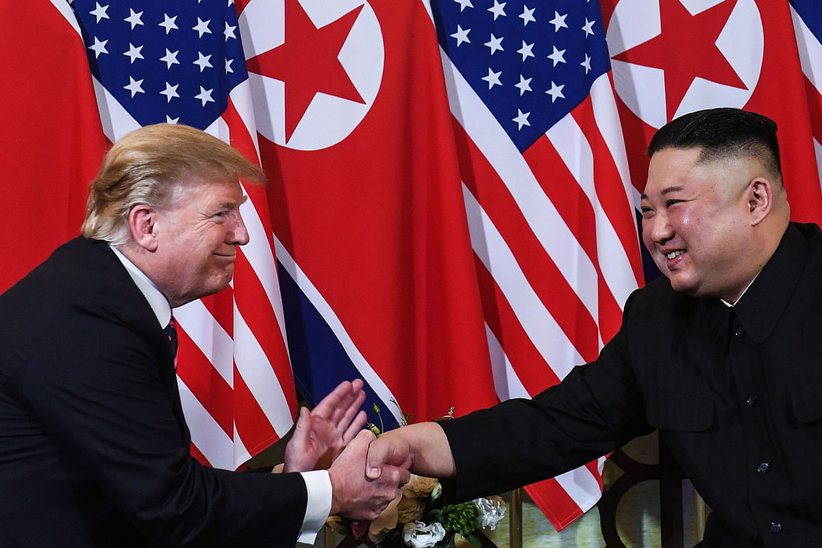 In this file photo taken on 27 February 2019 US president Donald Trump (L) shakes hands with North Korea`s leader Kim Jong Un following a meeting at the Sofitel Legend Metropole hotel in Hanoi. Photo: AFP