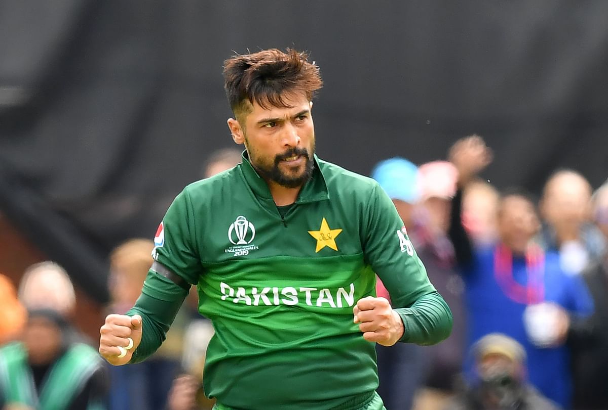Pakistan`s Mohammad Amir celebrates after the dismissal of Australia`s Alex Carey during the 2019 Cricket World Cup group stage match at The County Ground in Taunton, southwest England, on 12 June 2019. Photo: AFP