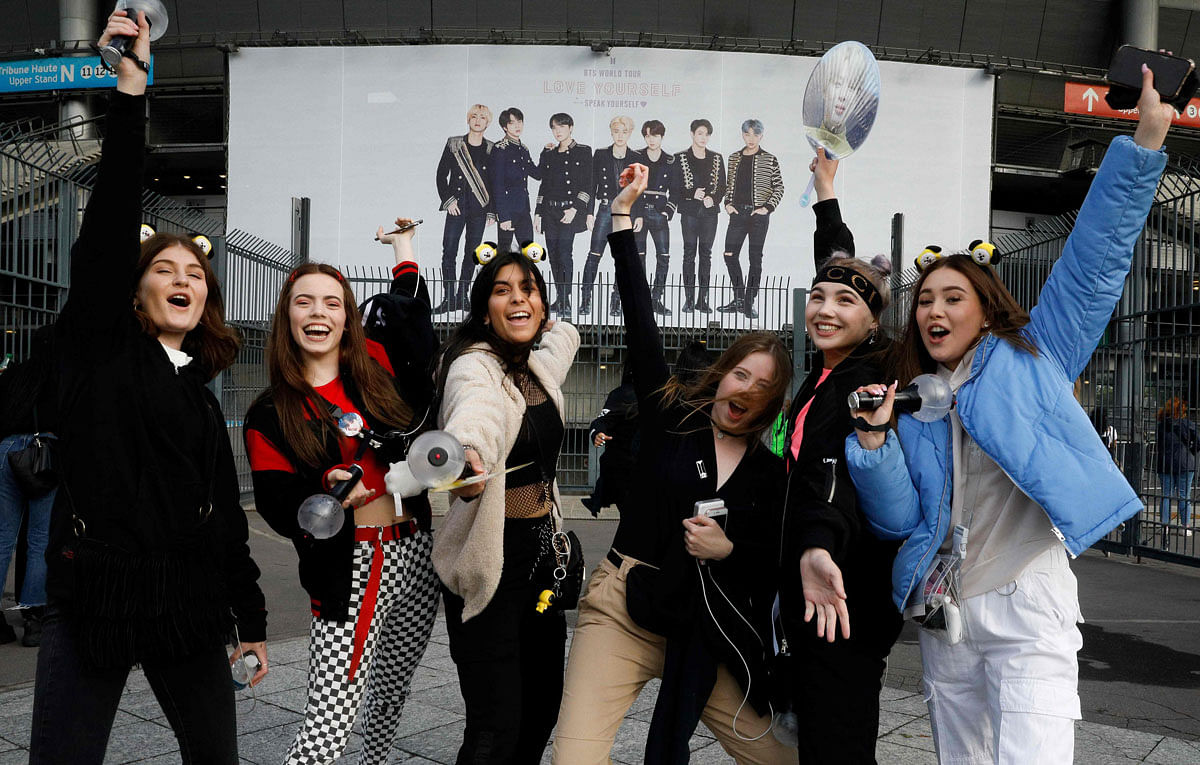 In this file photo taken on 7 June 2019 fans react as they arrive for a concert of the South Korean K-pop boy band BTS at the Stade-de-France stadium in Saint-Denis, on the outskirts of Paris. The seven-piece South Korean boy band, whose world tour `Love Yourself: Speak Yourself`, came to Paris for two nights late last week, after a string of sold-out shows in Los Angeles, Chicago and London`s iconic Wembley Stadium. Photo: AFP