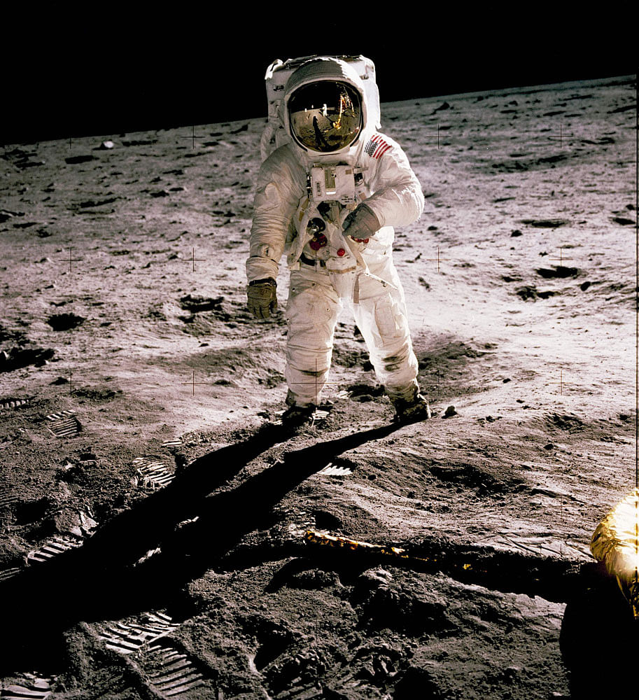 This photo obtained from NASA and taken by Neil Armstrong (reflected on helmet) shows Edwin `Buzz` Aldrin walking on the Moon on 20 July 1969. Photo: AFP