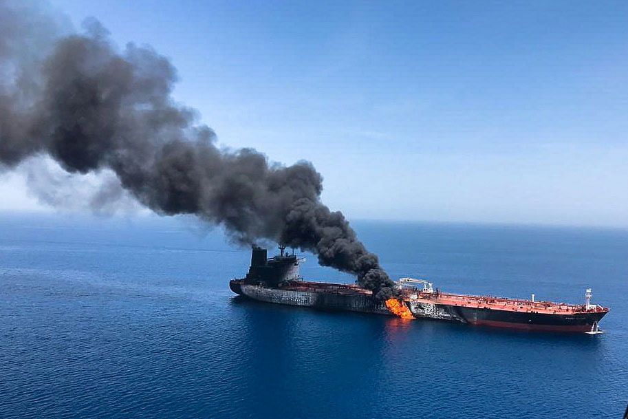 An oil tanker is seen after it was attacked at the Gulf of Oman, in waters between Gulf Arab states and Iran, 13 June 2019. Photo: Reuters