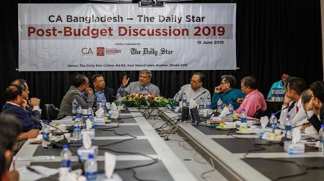Institute of Chartered Accounts of Bangladesh (ICAB) and The Daily Star jointly organise a roundtable on the proposed budget for 2019-20 fiscal year it at the Daily Star office on Saturday. Photo: Sabina Yeasmin
