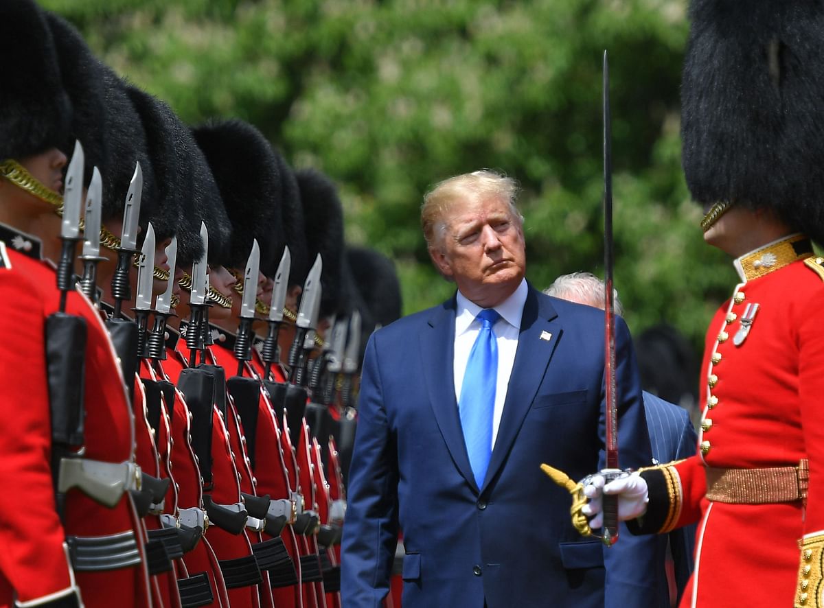 In this file photo taken on 3 June 2019, US president Donald Trump inspects an honour guard during a welcome ceremony at Buckingham Palace in central London. Photo: AFP