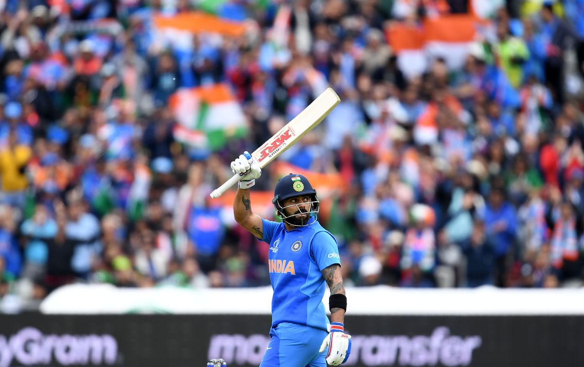India`s captain Virat Kohli celebrates after scoring a half-century (50 runs) during the 2019 Cricket World Cup group stage match between India and Pakistan at Old Trafford in Manchester, northwest England, on 16 June 2019. Photo: AFP