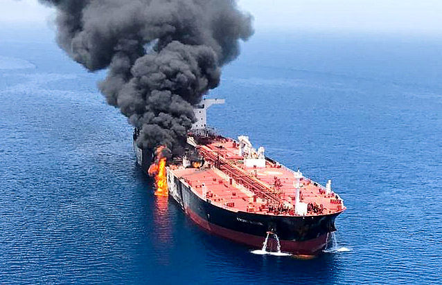 An oil tanker is seen after it was attacked at the Gulf of Oman, in waters between Gulf Arab states and Iran on 13 June. Photo: Reuters