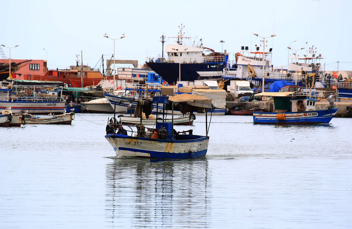A Tunisian fishing boat arrives at the port of Zarzis in the southern coast of Tunisia on 21 May 2019. Tunisian fishermen are finding themselves more and more involved in rescuing illegal boats leaving Libya for Italy, due to the difficulties of NGOs in the eastern Mediterranean and the disengagement of European military ships. Most of the fishermen have already brought back migrants - saving hundreds of lives over the years. Photo: AFP