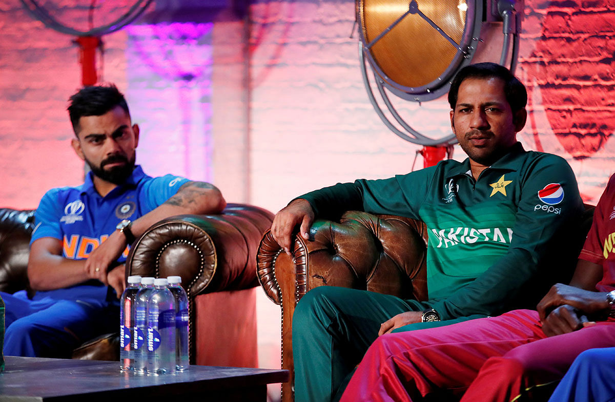 Pakistan`s Sarfaraz Ahmed and India`s Virat Kohli during the Captains Press Conference of ICC Cricket World Cup at The Film Shed, London, Britain on 23 May 2019. Reuters File Photo