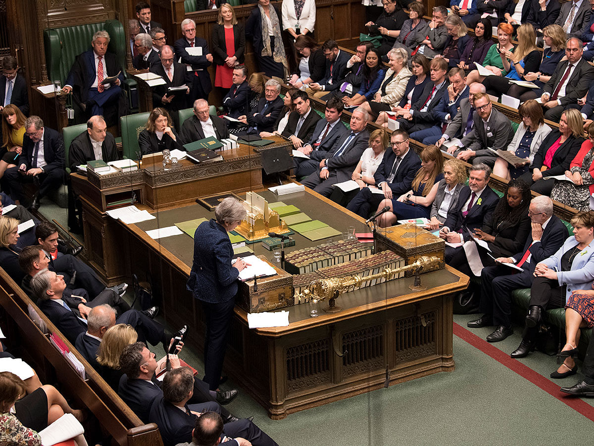 Britain`s prime minister Theresa May speaks at the House of Commons during prime minister`s Questions in London, Britain 12 June 2019. Photo: Reuters