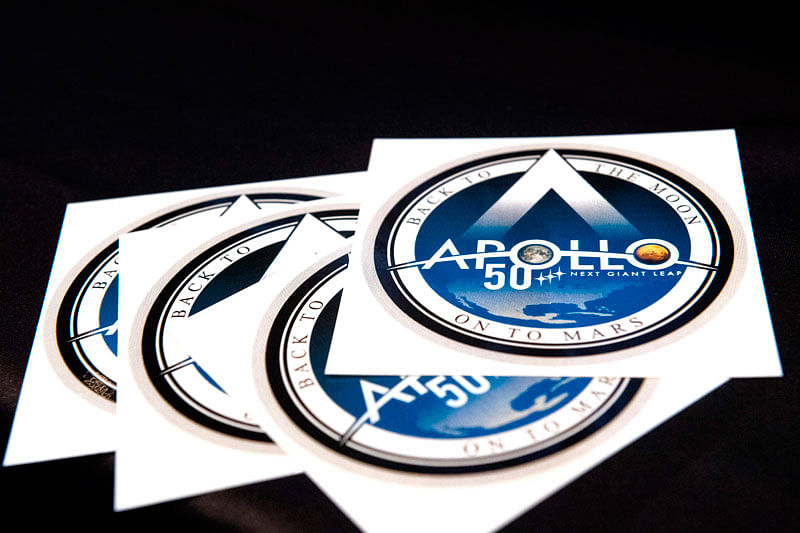 In this file photo taken on 10 April 2019 stickers celebrating the 50th anniversary of NASA`s Apollo 11 mission were made available to the public during the 35th Space Symposium at The Broadmoor in Colorado Springs, Colorado. Photo: AFP