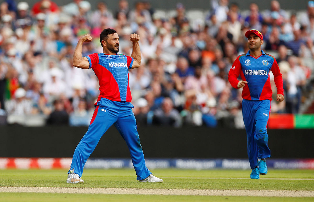 Afghanistan`s Gulbadin Naib celebrates the wicket of England`s Jonny Bairstow in the 2019 Cricket World Cup group stage match at Old Trafford in Manchester, England, on 18 June 2019. Photo: Reuters