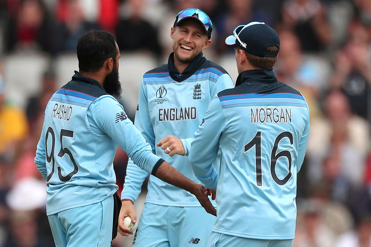 England`s Adil Rashid celebrates with Joe Root and Eoin Morgan after taking the wicket of Afghanistan`s Asghar Afghan in the ICC Cricket World Cup match at Old Trafford, Manchester, Britain on 18 June 2019. Photo: Reuters
