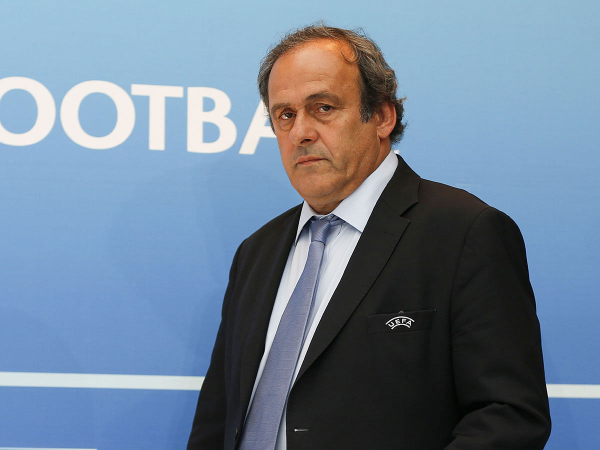 In this file photo taken on August 28, 2015 UEFA chief Michel Platini arrives for a UEFA press conference after the draw for the UEFA Europa League football group stage 2015/16 in Monaco. Ex-UEFA chief Michel Platini was arrested on June 18, 2019 in connection with a probe into the awarding of the 2022 World Cup to Qatar, a source close to the investigation said. AFP