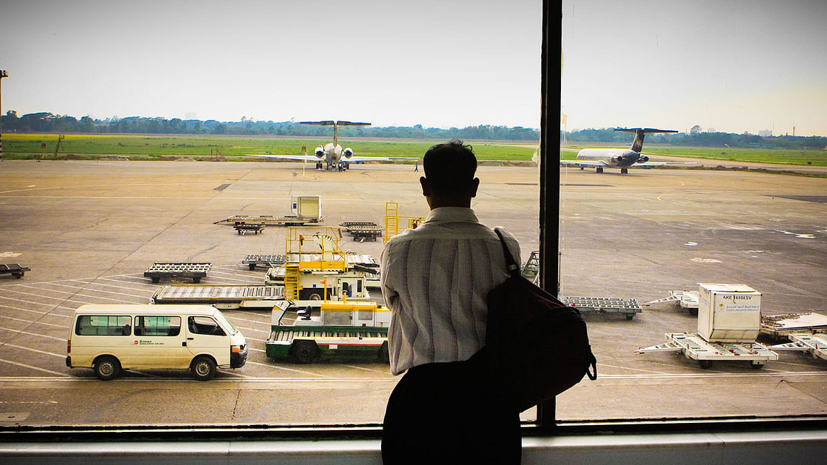 A migratory worker waits for his flight at Dhaka International Airport. This photo was taken from Wikimedia Commons for symbolic purpose