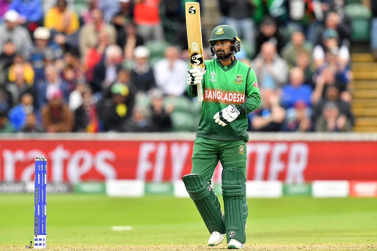 Bangladesh`s Liton Das celebrates his half-century during the 2019 Cricket World Cup group stage match between West Indies and Bangladesh at The County Ground in Taunton, southwest England, on 17 June 2019.