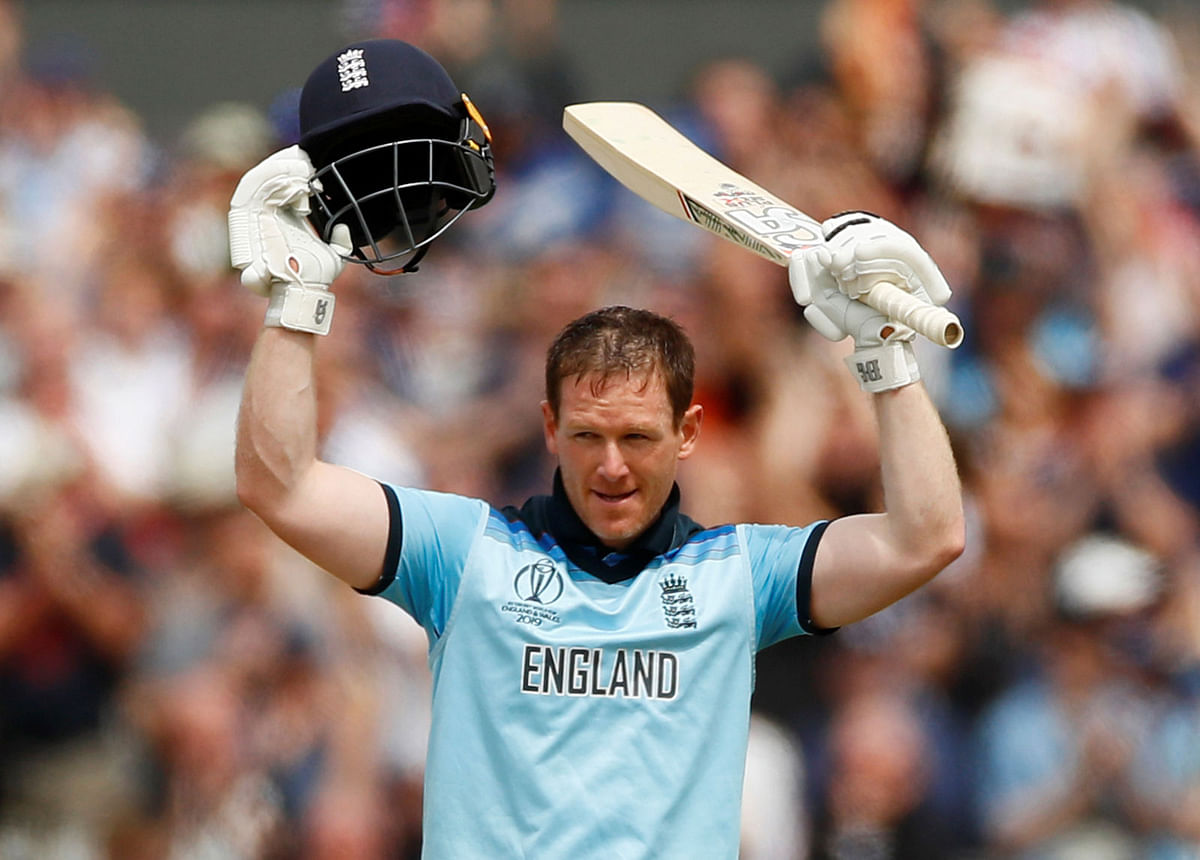 England`s Eoin Morgan celebrates his century during the 2019 Cricket World Cup group stage match against Afghanistan at Old Trafford in Manchester, England, on 18 June 2019. Photo: Reuters