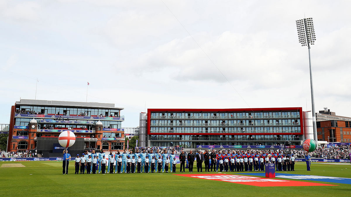 General view as the teams line up before the match. Photo: Reuters