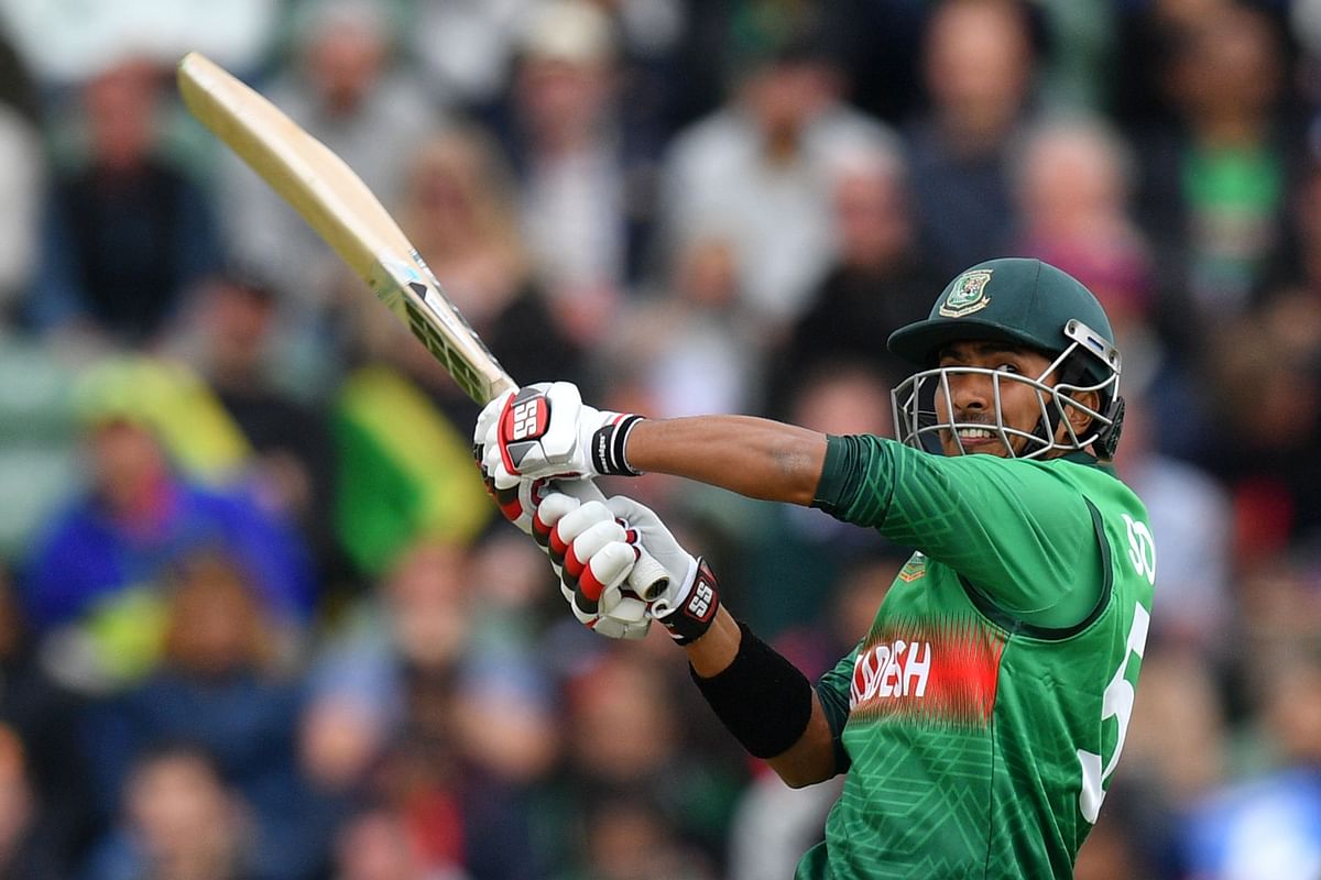 Bangladesh`s Soumya Sarkar hits a shot during the 2019 Cricket World Cup group stage match between West Indies and Bangladesh at The County Ground in Taunton, southwest England, on 17 June 2019.