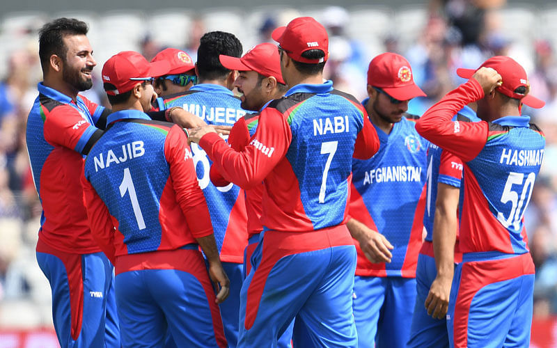 Afghanistan’s Dawlat Zadran celebrates with teammates after taking the wicket of England’s James Vince during the 2019 Cricket World Cup group stage match between England and Afghanistan at Old Trafford in Manchester, northwest England, on 18 June 2019. Photo: AFP