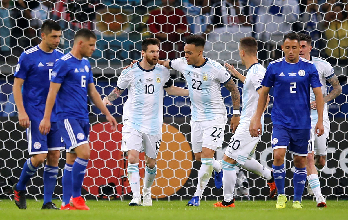 Argentina`s Lionel Messi celebrates scoring their first goal with Lautaro Martinez in the Copa America Brazil 2019 Group B match against Paraguay at Mineirao Stadium, Belo Horizonte, Brazil on 19 June 2019. Photo: Reuters