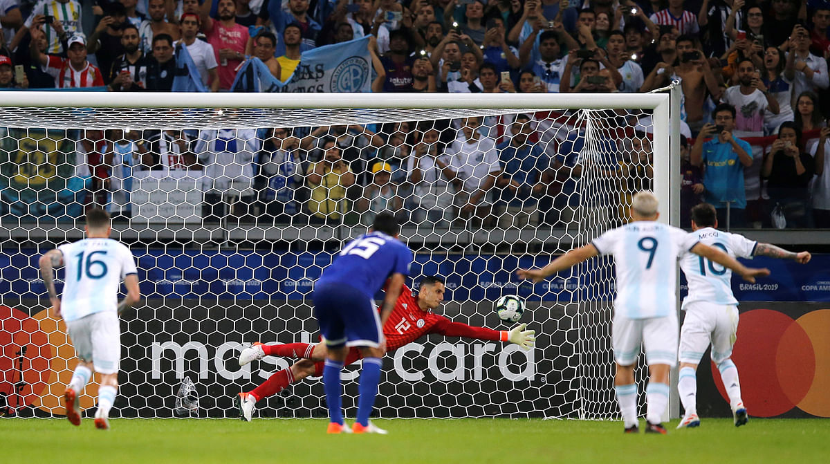 Argentina`s Lionel Messi scores their first goal from a penalty in the Copa America Brazil 2019 Group B match against Paraguay at Mineirao Stadium, Belo Horizonte, Brazil on 19 June 2019. Photo: Reuters