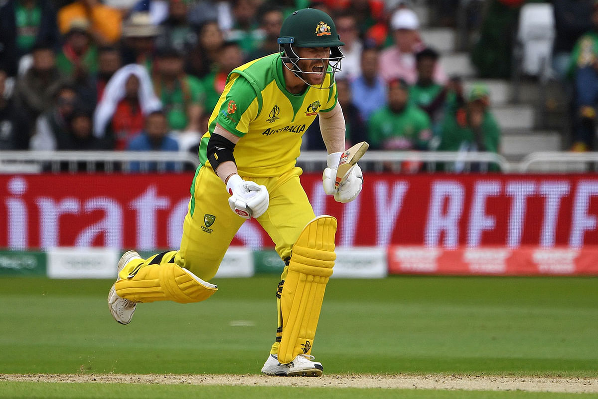 Australia`s David Warner celebrates his century during the 2019 Cricket World Cup group stage match between Australia and Bangladesh at Trent Bridge in Nottingham, central England, on 20 June 2019. Photo: AFP
