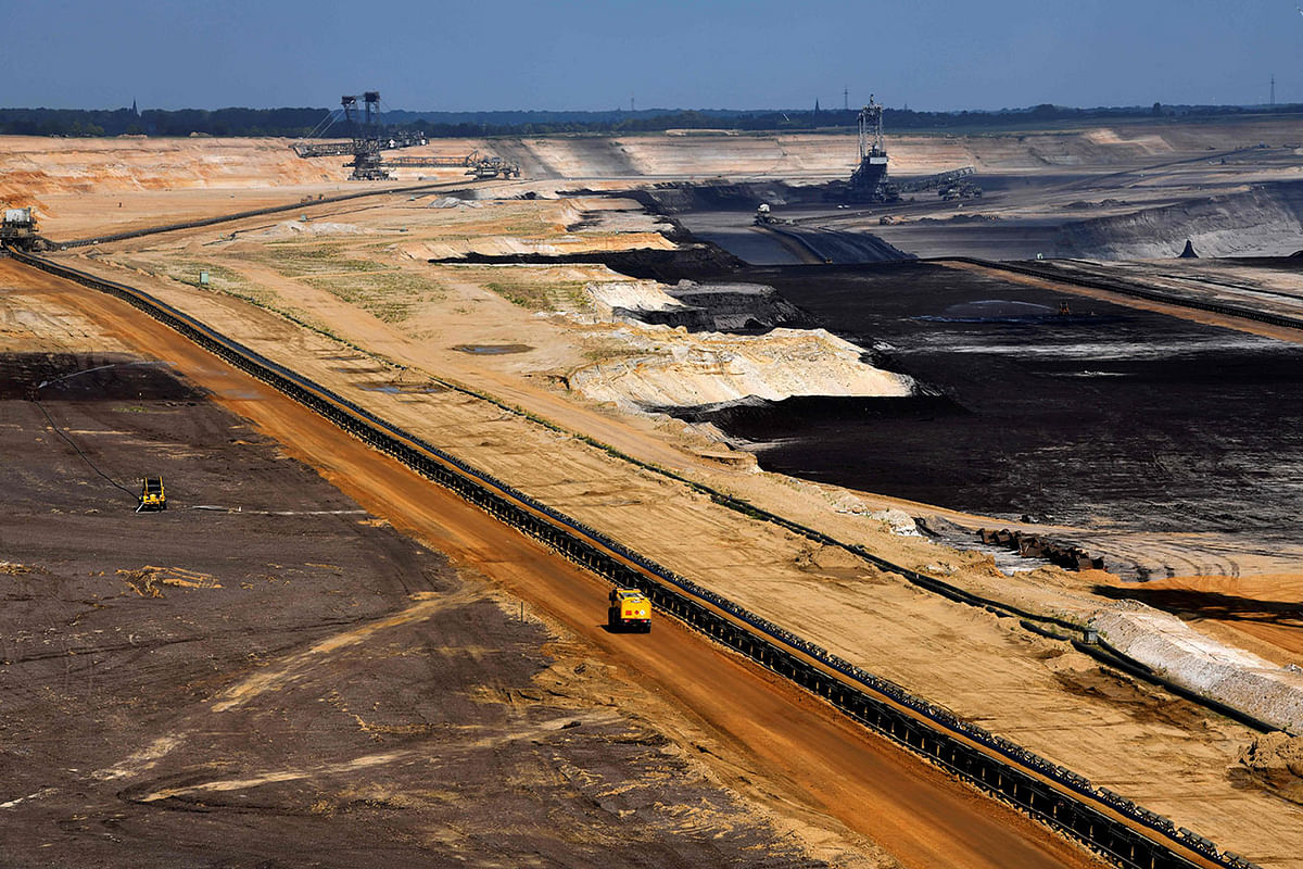 A truck drives at the Garzweiler lignite opencast mine of German energy giant RWE in Jackerath, western Germany on 19 June 2019. Photo: AFP