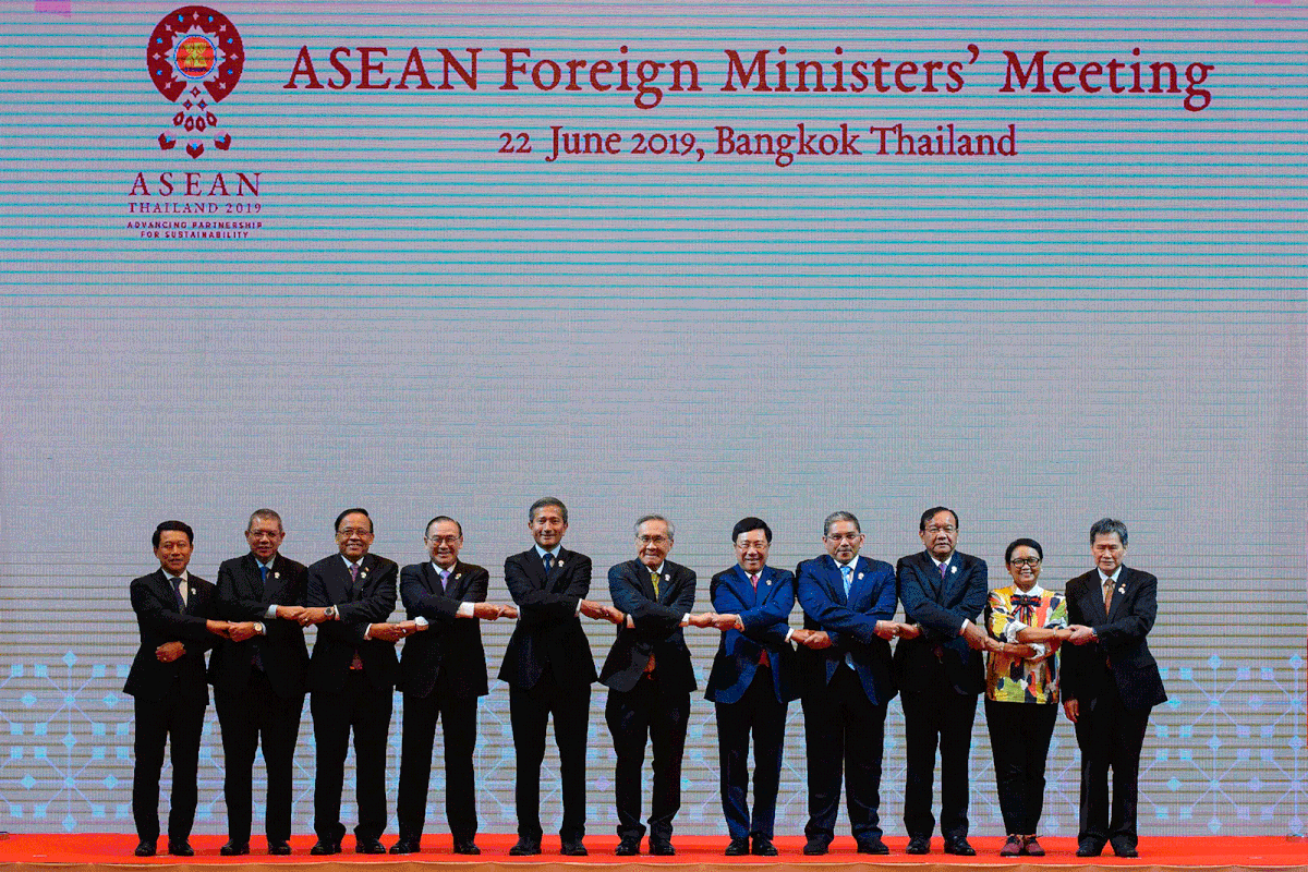 Foreign ministers of the Association of Southeast Asian Nations (ASEAN) from left, Laos Foreign Minister Saleumxay Kommasith, Malaysia Foreign Minister Saifuddin Abdullah, Myanmar`s Union Minister for International Cooperation Kyaw Tin, Philippines` Foreign Minister Teodoro Locsin, Singapore Foreign Minister Vivian Balakrishnan, Thailand Foreign Minister Don Pramudwinai, Vietnam Foreign Minister Pham Binh Minh, Brunei Second Minister of Foreign affaires and Trade Erywan Yusof, Cambodia Foreign Minister Prak Sokhonn, Indonesia Foreign Minister Retno Marsudi and ASEAN Secretary-General Lim Jock Hoi pose for a group photo during the ASEAN Foreign Ministers` meeting ahead of the ASEAN summit in Bangkok on 22 June 2019. Photo: AFP