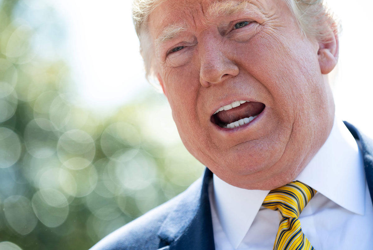 US president Donald Trump speaks to the media prior to departing on Marine One from the South Lawn of the White House in Washington, DC, 22 June 2019, as he travels to Camp David, Maryland. Trump said Iran was “very wise “ not to shoot down the manned plane when it downed the drone and “we appreciate “ that move. Photo: AFP