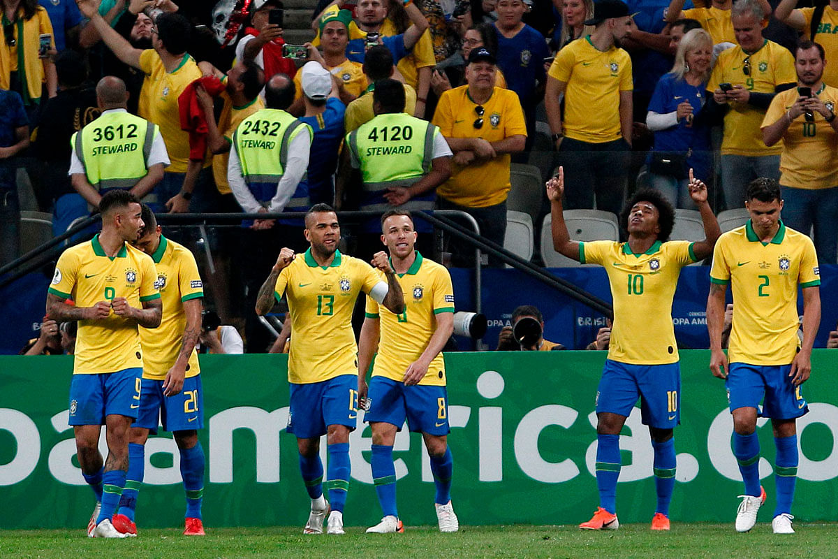 Brazil`s Willian (2-R) celebrates after scoring against Peru during their Copa America football tournament group match at the Corinthians Arena in Sao Paulo, Brazil, on 22 June 2019. Photo: AFP
